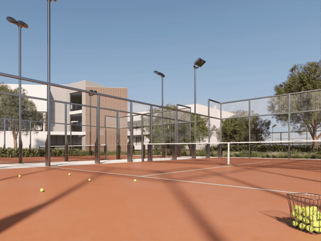 Tennis court with nets and tennis balls in Algarve, Portugal, near The Court property.