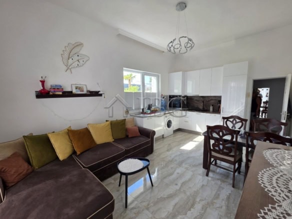 Cozy living room with open kitchen in Magnolia Residence 6, Sunny Beach. Modern furniture and bright.
