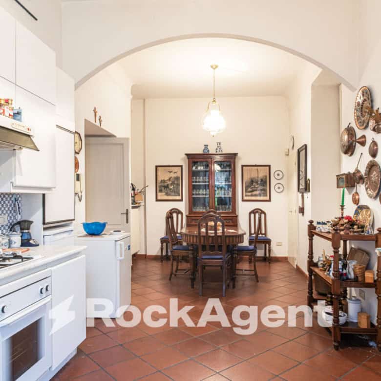 Spacious kitchen and dining area in a luxurious villa in Varzi, Italy. Perfect for family living and.