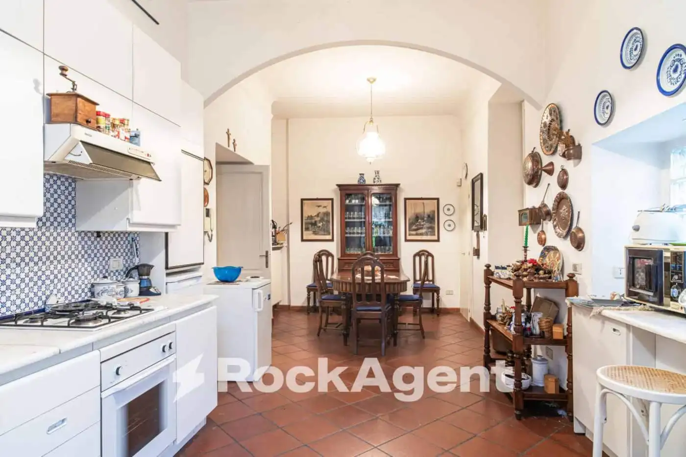 Spacious kitchen and dining area in a luxurious villa in Varzi, Italy. Perfect for family living and.