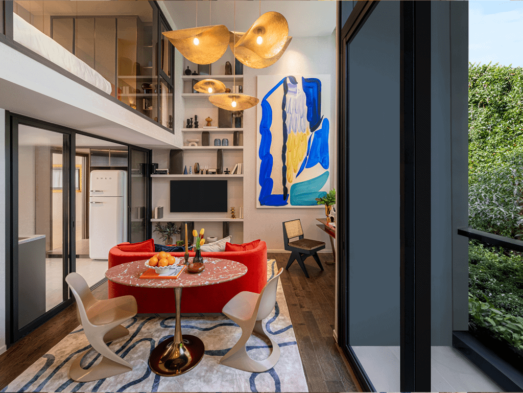 Contemporary Bangkok apartment interior featuring modern furniture, artwork, and natural light.