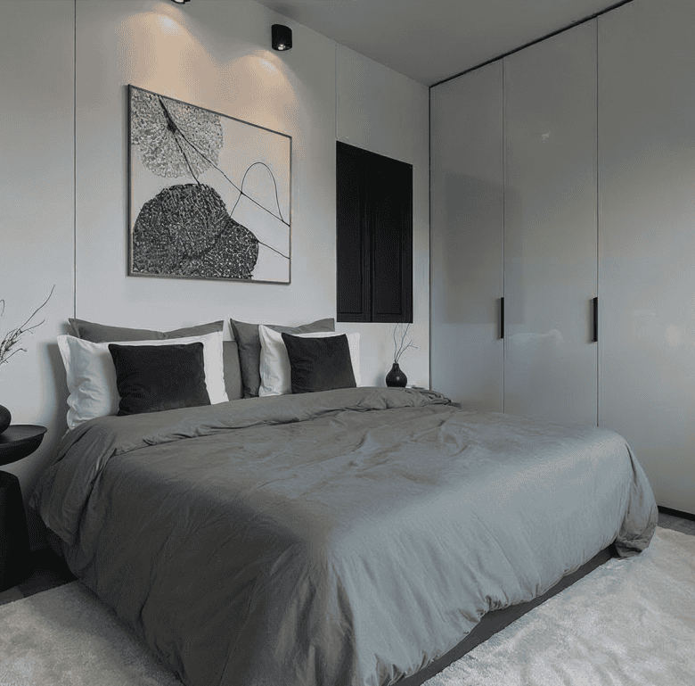 Elegant bedroom in Portside Residences, Athens, Greece, featuring contemporary furnishings.