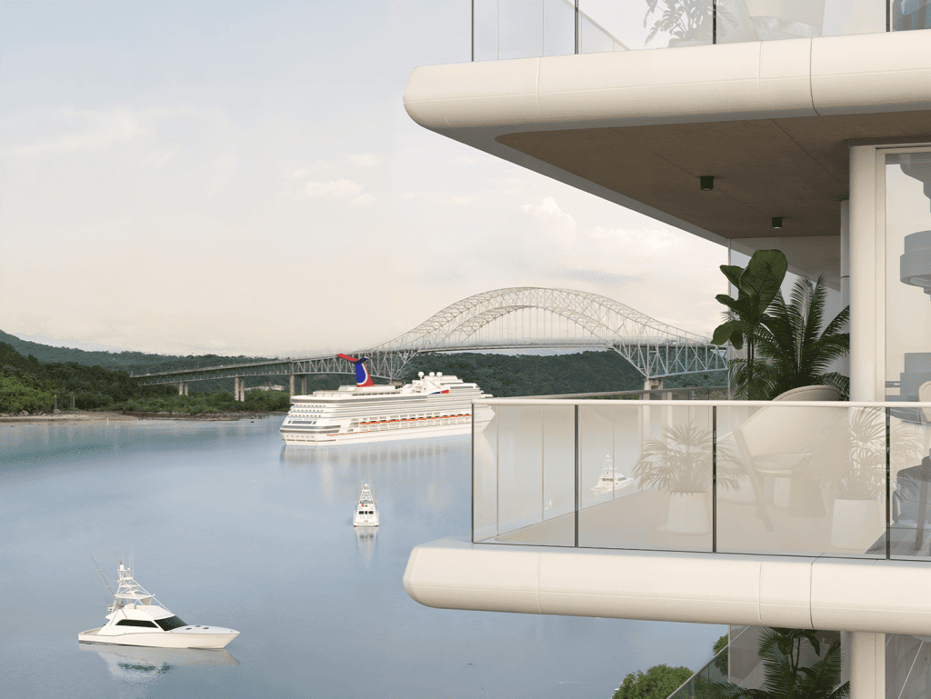 Balcony view of Nautilus in Panama City with boats and bridge in the background.