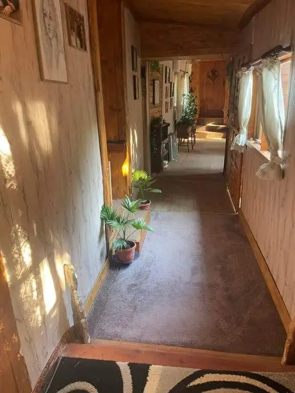 Charming interior of a 4-bedroom country house in Traykovo, Bulgaria, featuring wooden walls, natura.