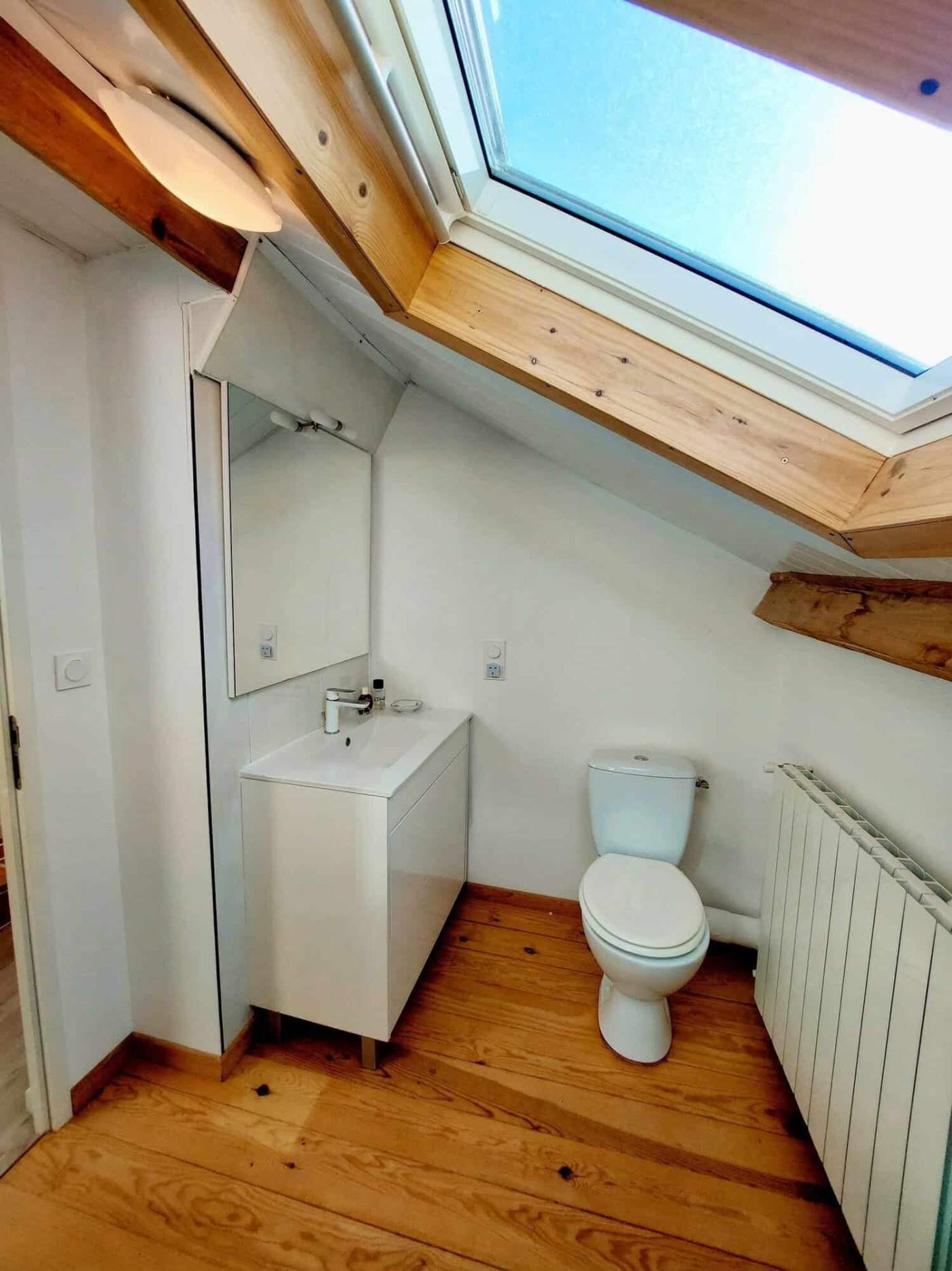 Farmhouse for Sale in Madiran Village France | Homesgofast Beautiful bedroom in a charming farmhouse in Madiran, France, perfect for country living.
