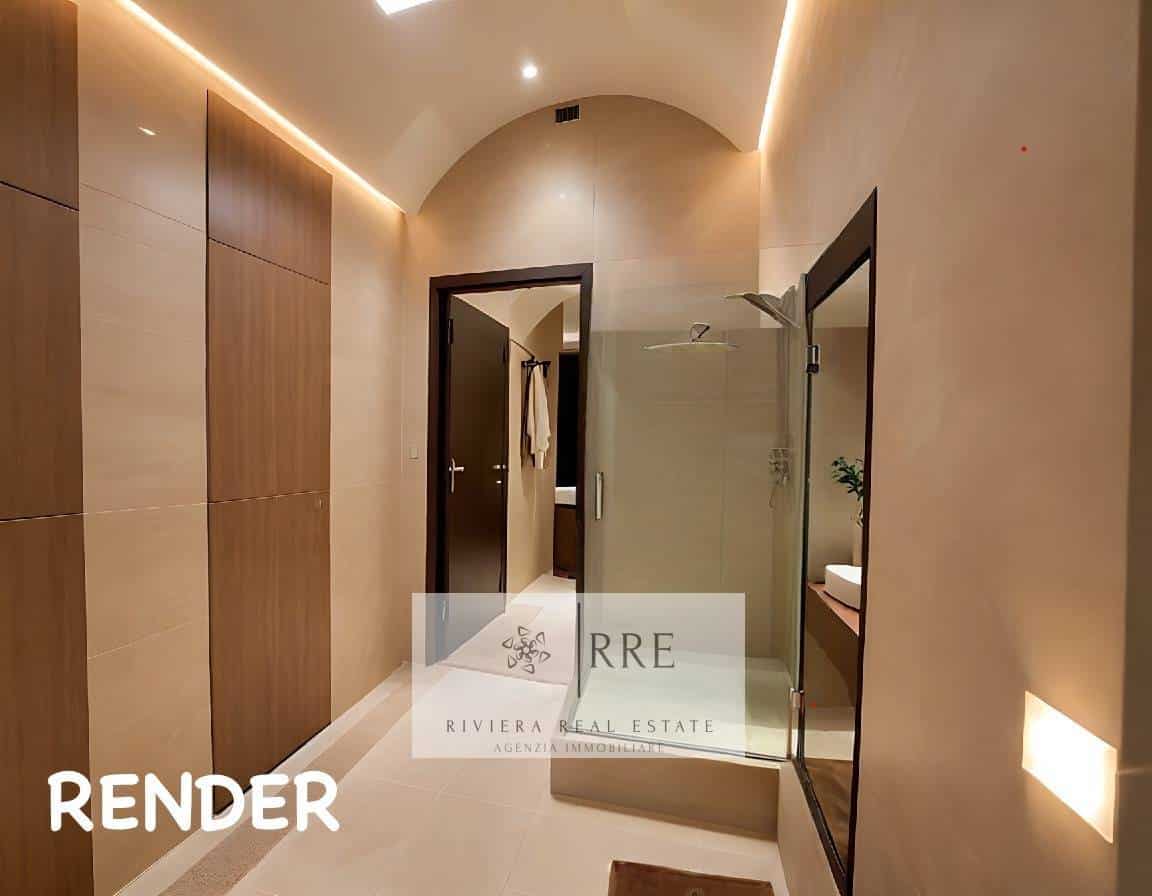 Modern bathroom featuring a glass shower, sleek design, and contemporary fixtures.