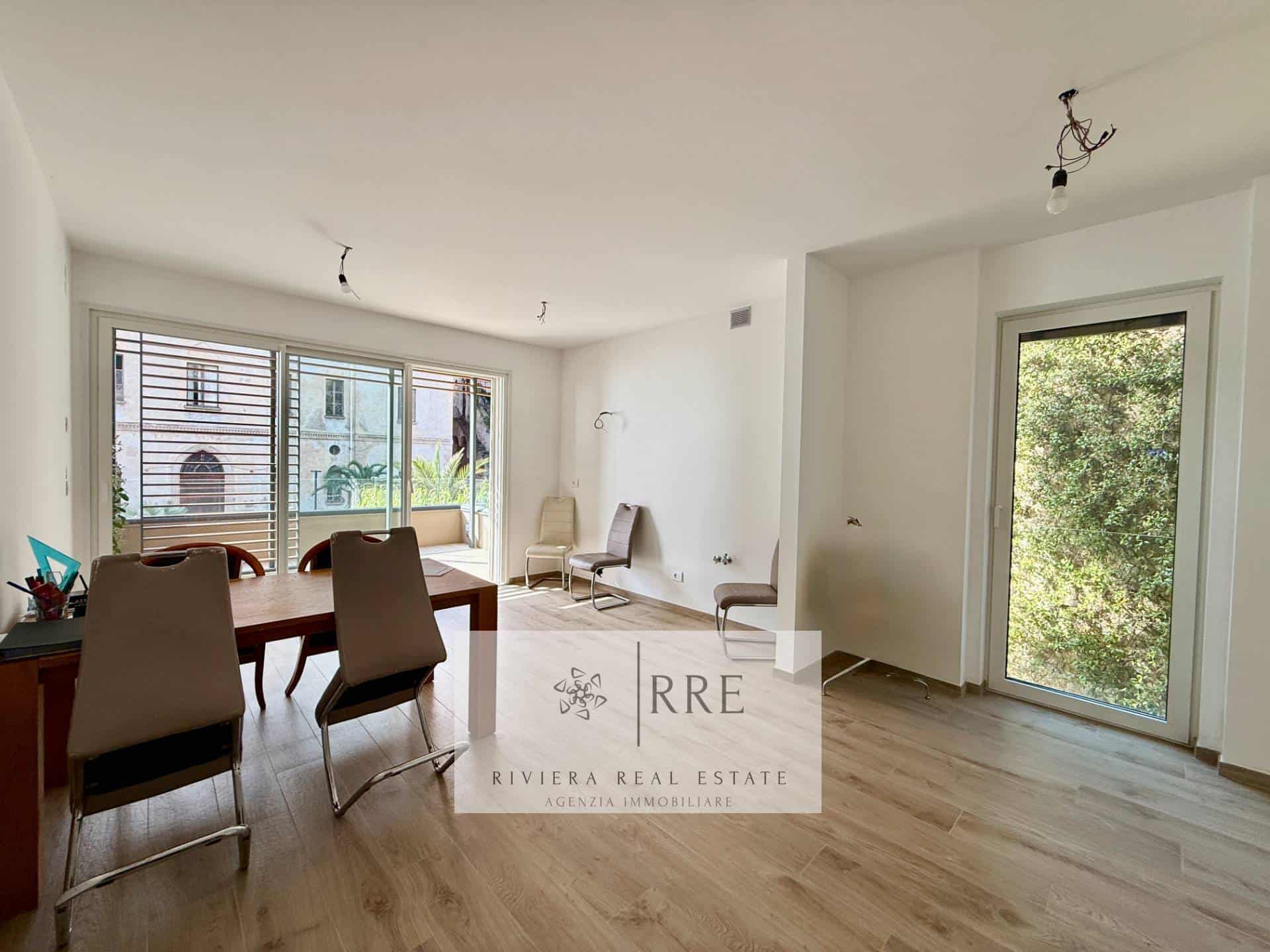 Spacious living area featuring large windows that provide abundant natural light and scenic views. P.