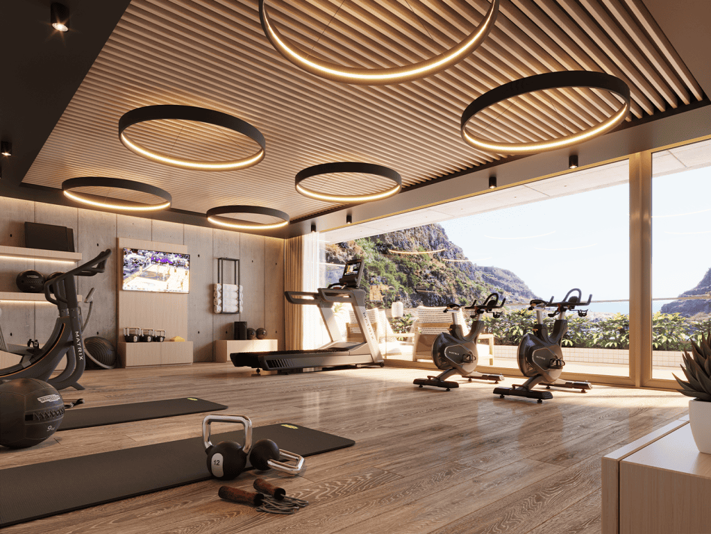 A modern gym in Ribeira Brava, Madeira, Portugal, featuring scenic mountain views and contemporary w.