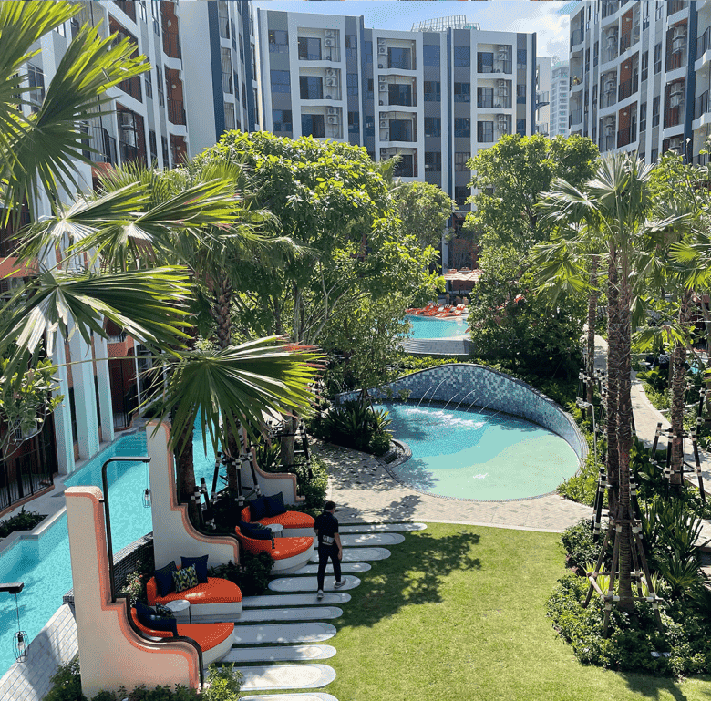 Beautiful view of tropical gardens and swimming pools in Hua Hin, Thailand.