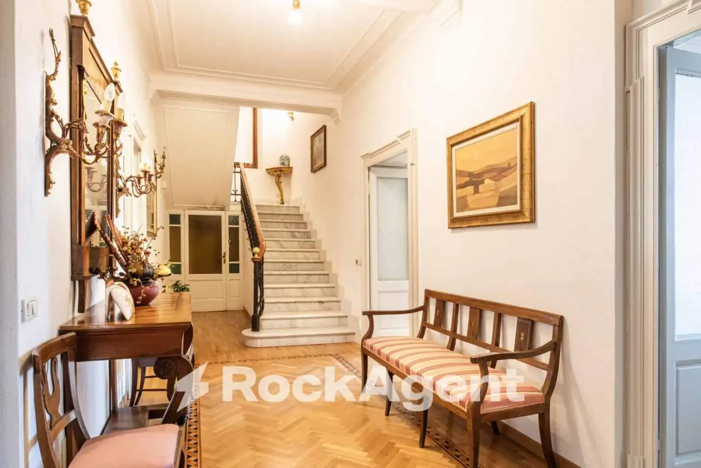 Elegant entrance hall of a luxury villa in Varzi, Italy.