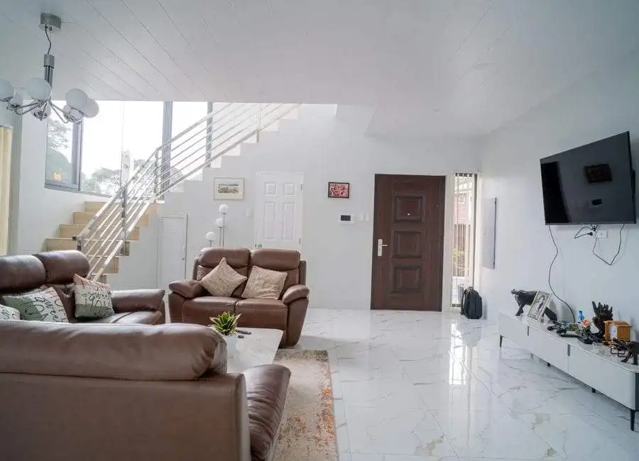 Luxury 4BR Villa in The Orchard Golf Club Spacious living room of a luxury 4-bedroom villa at The Orchard Golf and Country Club, Dasmarinas, P.