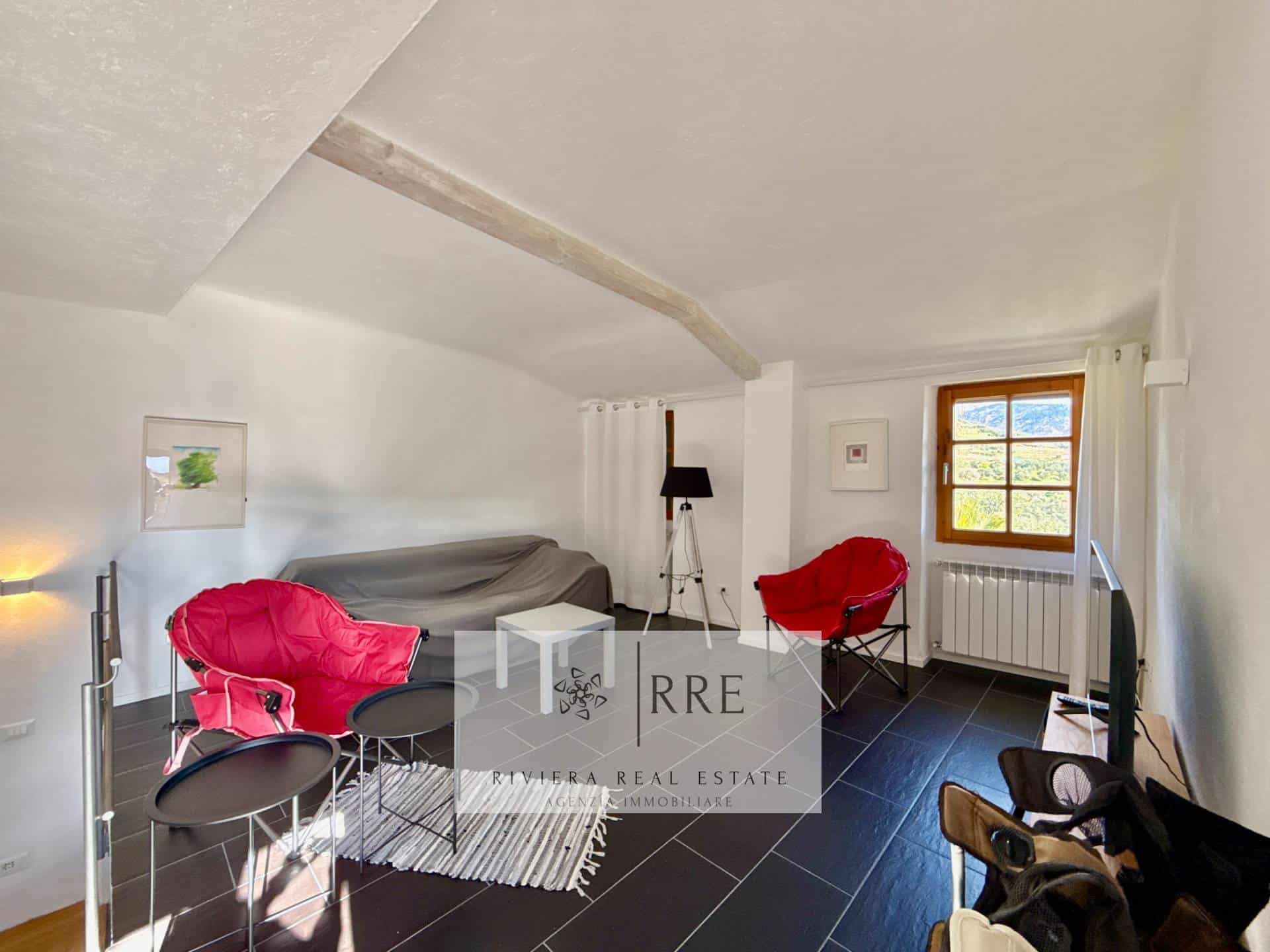 Bright attic apartment with contemporary furnishings and natural light.