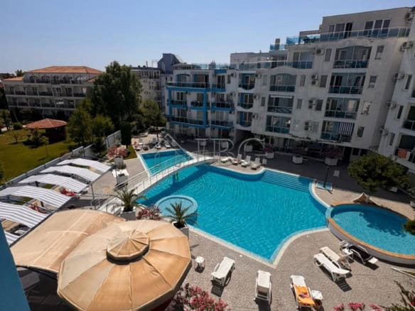 Bright 1-bedroom apartment overlooking pool in Nessebar, perfect for relaxing holidays.