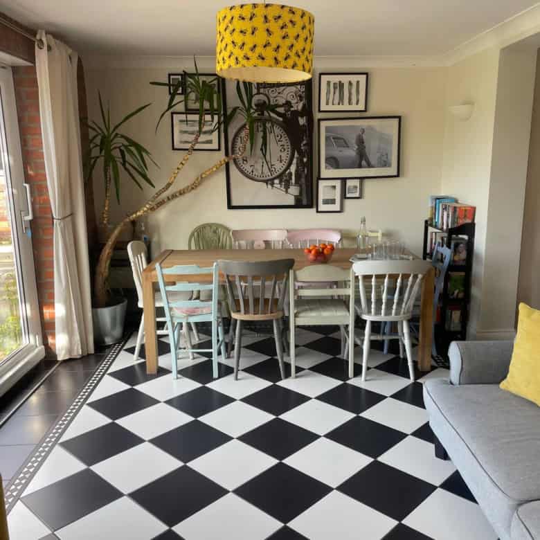Bright dining area with contemporary furniture and artwork, perfect for family meals and gatherings.