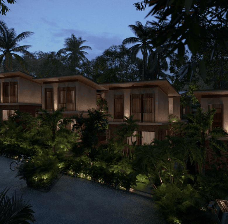 Eco villas in Santa Teresa, Nicoya Peninsula, Costa Rica, surrounded by lush tropical greenery.