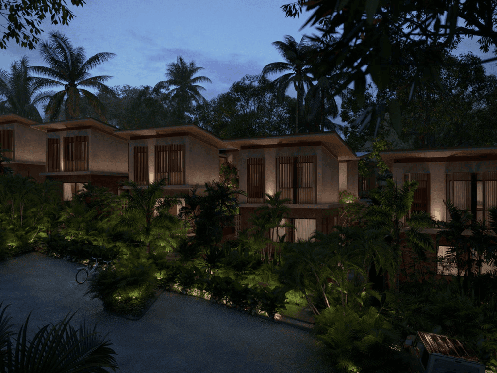 Eco villas in Santa Teresa, Nicoya Peninsula, Costa Rica, surrounded by lush tropical greenery.