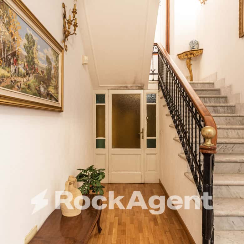 Elegant entrance hall of a luxury villa in Varzi, Italy.