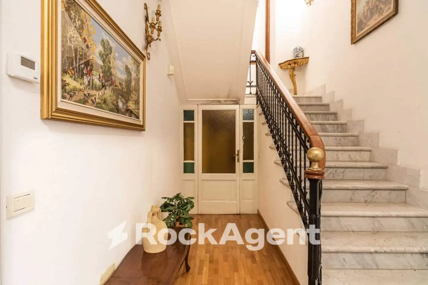 Elegant entrance hall of a luxury villa in Varzi, Italy.