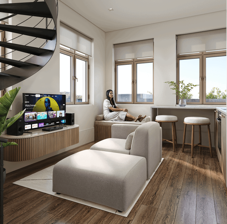 Bright living room with large windows, comfortable sofa, and indoor plants in Matosinhos, Portugal.