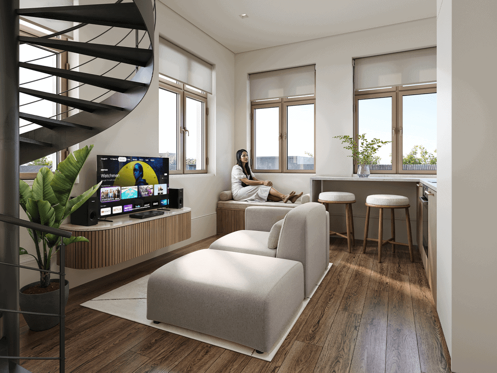 Bright living room with large windows, comfortable sofa, and indoor plants in Matosinhos, Portugal.