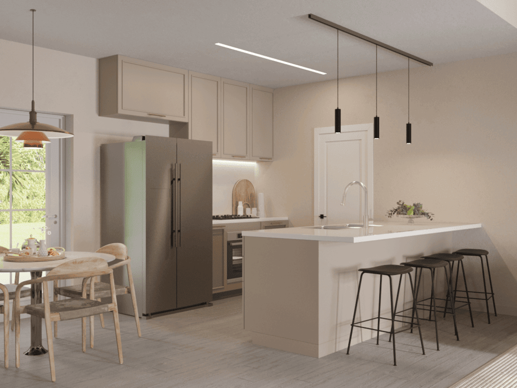 Stylish kitchen featuring a large island, stainless steel appliances, and cozy dining space.