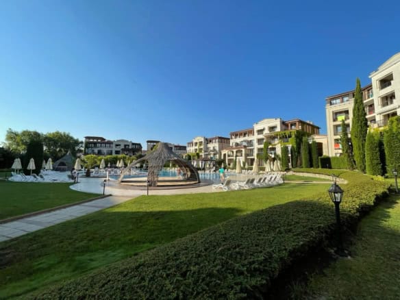 Modern apartment at Green Life Beach Resort with pool and lush surroundings in Sozopol.