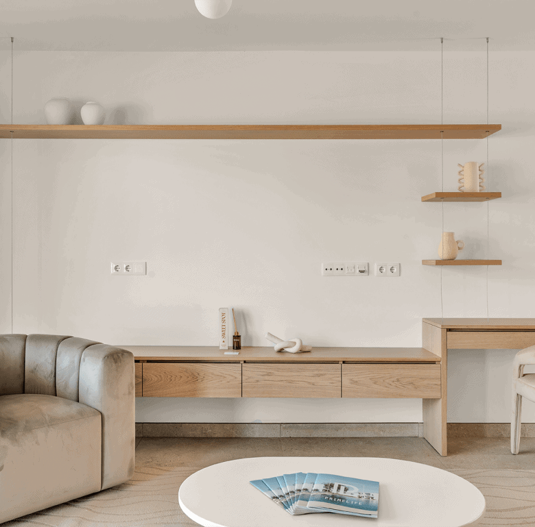 Bright Algarve living room with minimalist decor and natural wood accents.