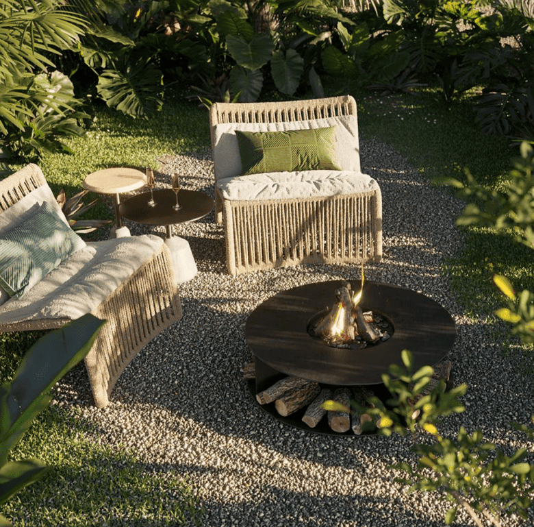 Outdoor seating with fire pit and lush greenery in Santa Teresa, Nicoya Peninsula, Costa Rica.