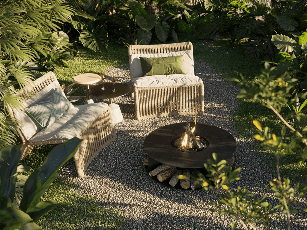 Outdoor seating with fire pit and lush greenery in Santa Teresa, Nicoya Peninsula, Costa Rica.