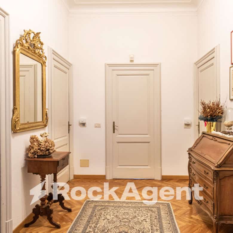 Elegant villa interior with classic decor and antique furniture in Varzi, Italy.