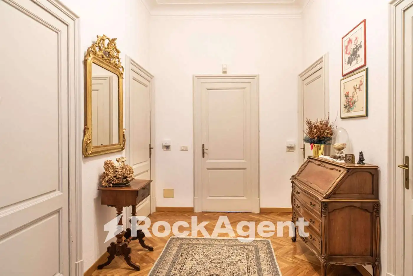 Elegant villa interior with classic decor and antique furniture in Varzi, Italy.