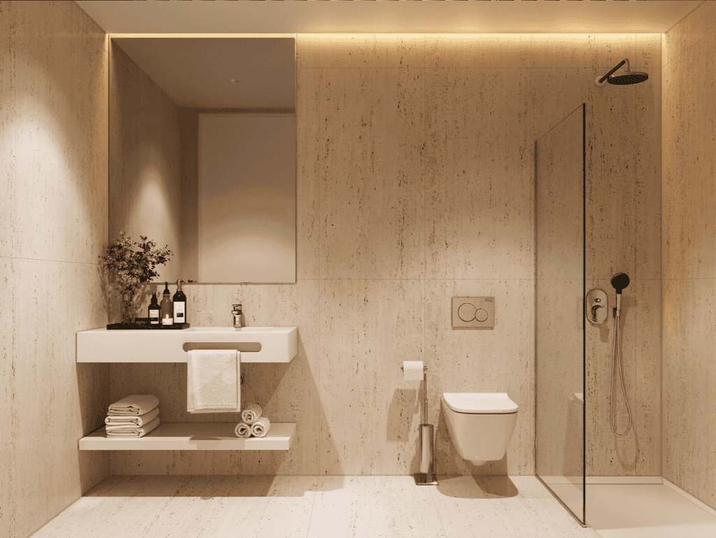 Elegant bathroom with neutral tones, featuring a sleek sink, toilet, and walk-in shower.