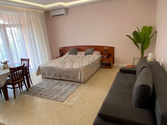Modern studio apartment with pool view in Palazzo complex, Sunny Beach. Bright, airy interior with c.