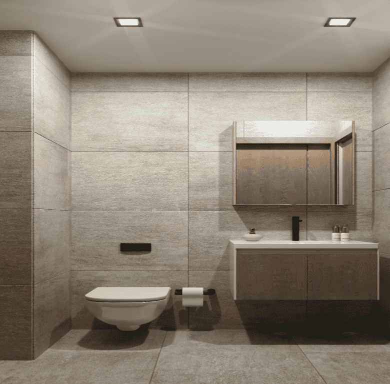 Bathroom with beige tiles, wall-mounted toilet, and wooden vanity.