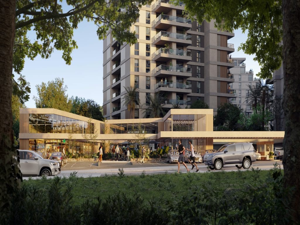 Contemporary apartment complex in Asuncion, Paraguay featuring retail outlets and lush surroundings.