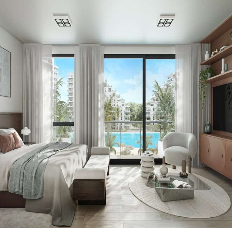 Modern living room overlooking Crystal Lagoon in Asuncion, Paraguay, with stylish furniture and larg.