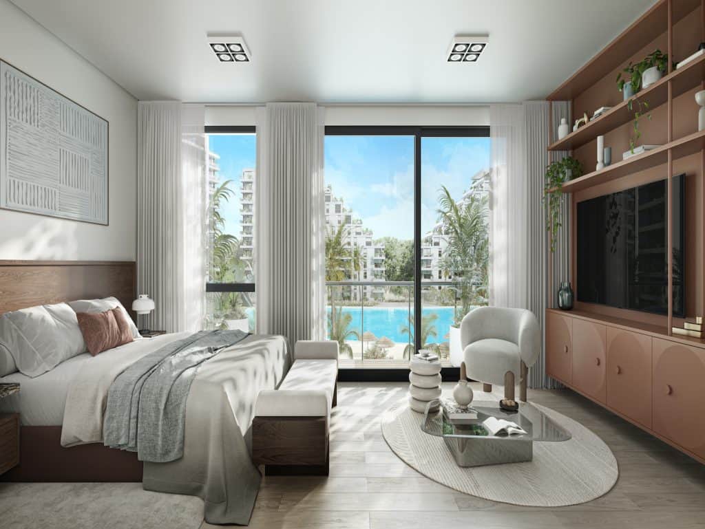 Modern living room overlooking Crystal Lagoon in Asuncion, Paraguay, with stylish furniture and larg.