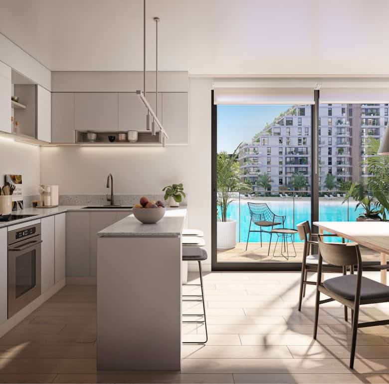 Modern kitchen with view of Crystal Lagoon in Asuncion, Paraguay.