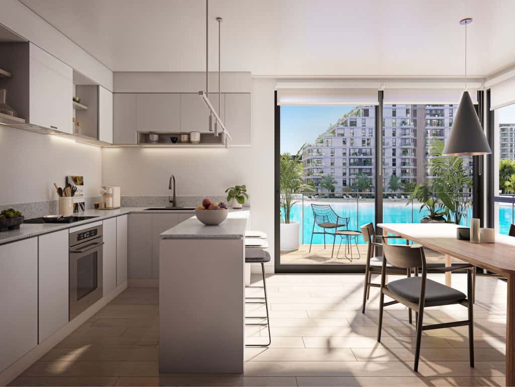 Modern kitchen with view of Crystal Lagoon in Asuncion, Paraguay.