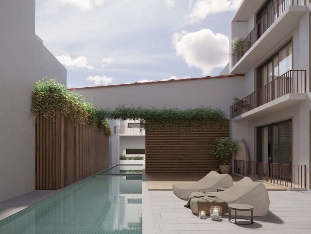 Contemporary apartment terrace with pool and lounge chairs in Peniche, Portugal.