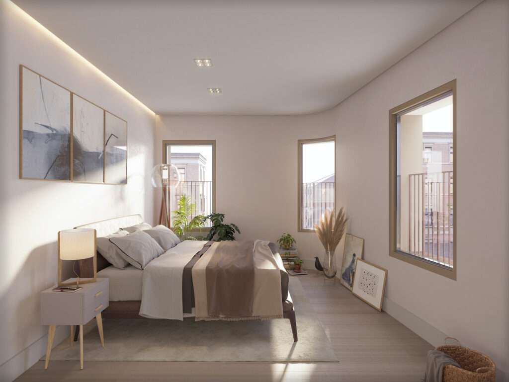 Bright, airy bedroom with large windows and minimalist decor in Peniche, Portugal.
