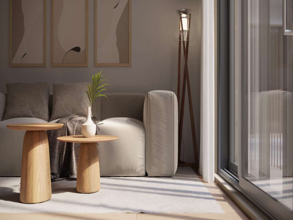 Bright living space with cozy sofa, wooden side tables, and stylish decor.