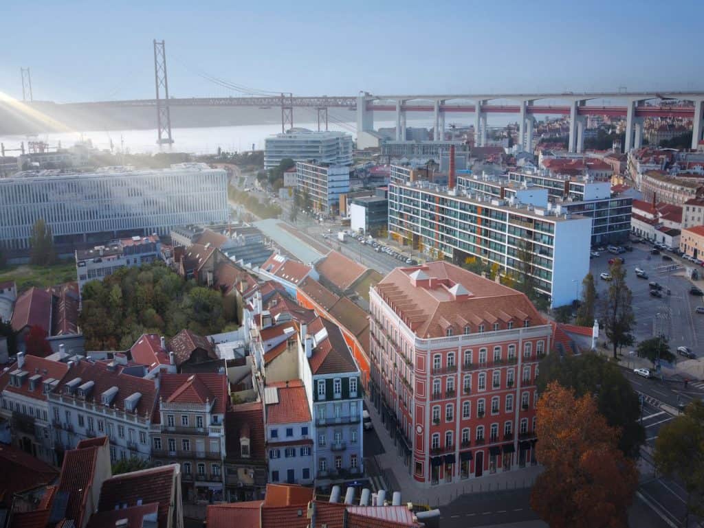 Historic Lisbon neighborhood with colorful buildings and narrow streets.