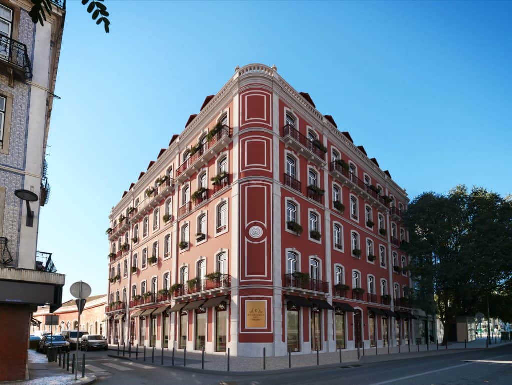 Elegant Renaissance-style building in Lisbon with ornate details and balconies.
