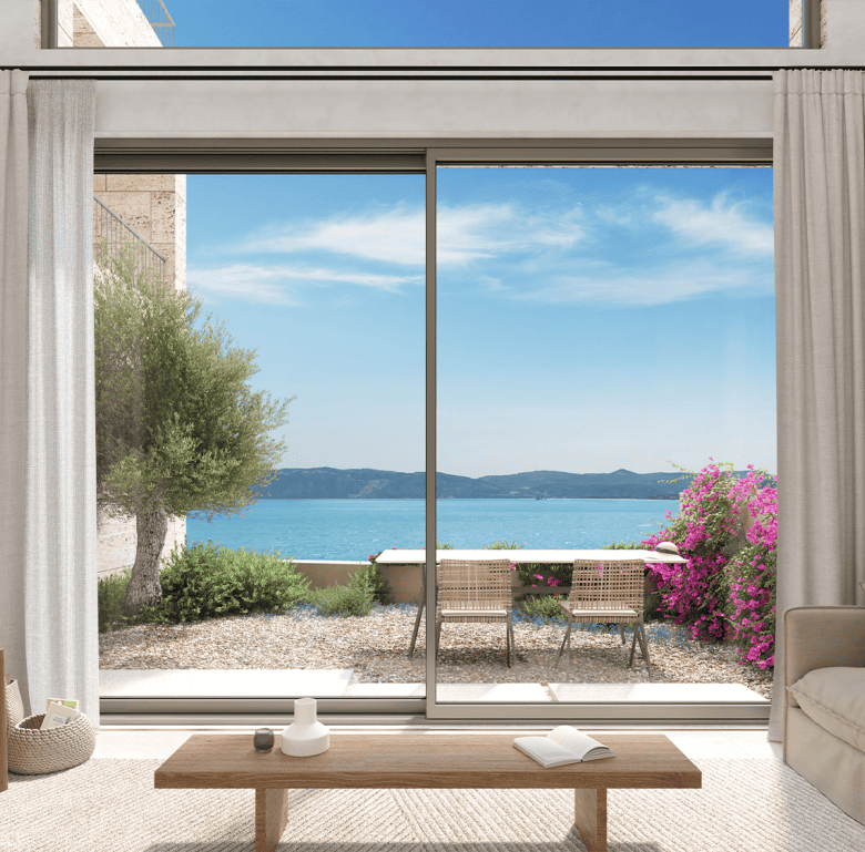Beautiful waterfront view from a modern living room overlooking the sea in Kissamos, Crete.