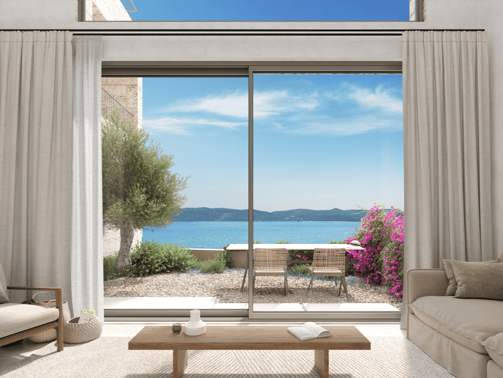 Beautiful waterfront view from a modern living room overlooking the sea in Kissamos, Crete.