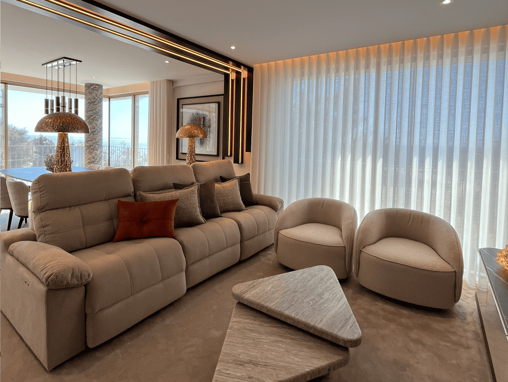 Elegant Porto apartment living room with modern furniture and large windows.