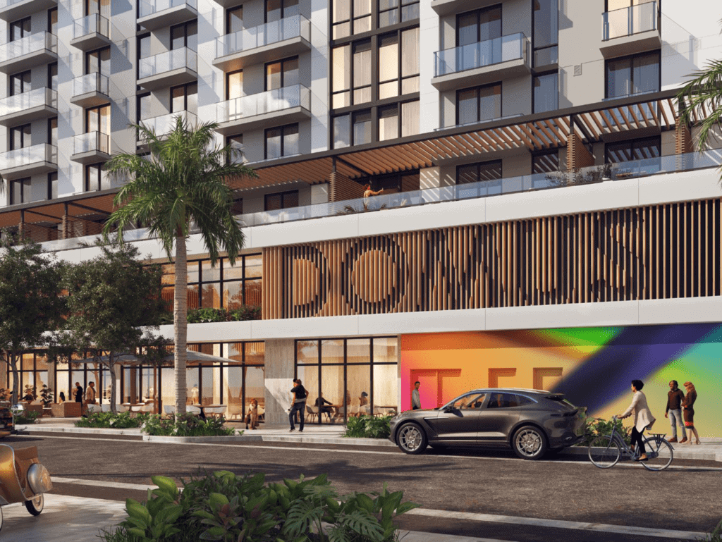 Modern Brickell Miami residential building with retail space and outdoor seating.