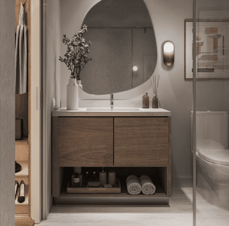 Elegant bathroom featuring a wooden vanity, mirror, and contemporary fixtures in Brickell, Miami.