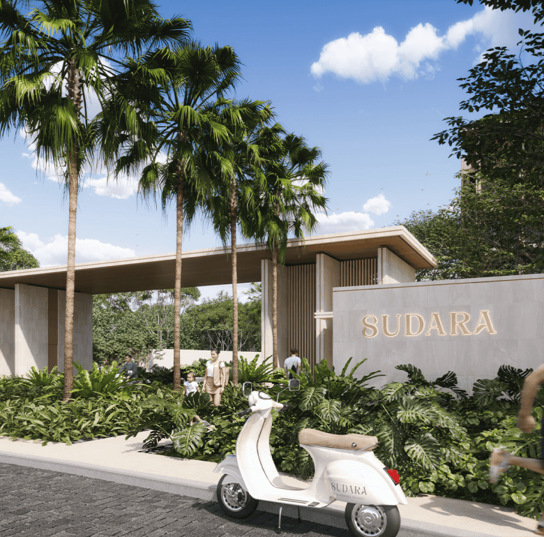 Modern entrance to Sudara in Phuket, Thailand with lush greenery and a scooter in front.